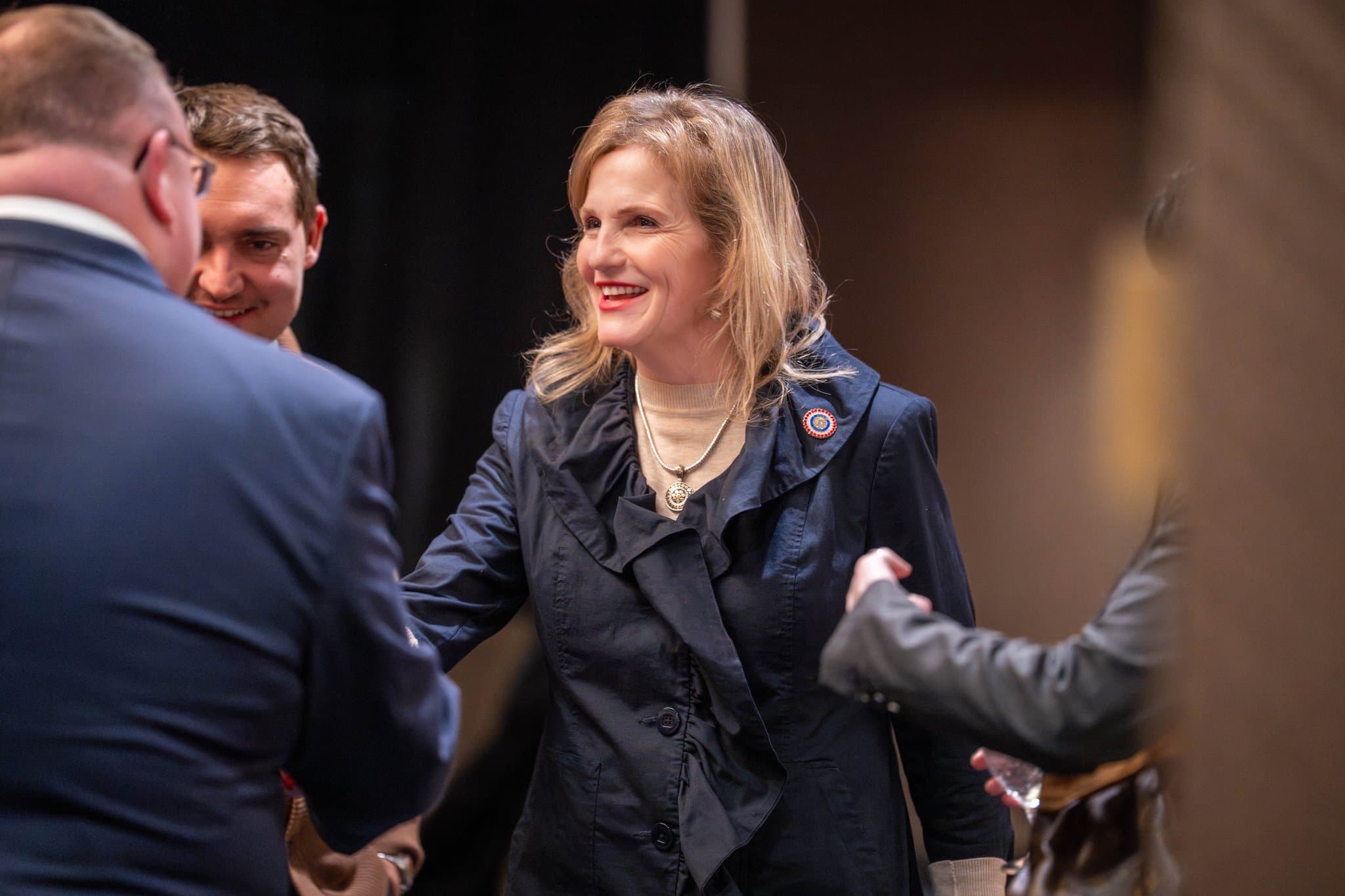 Woman being greeted very politely at a Leadership Institute Training in Alaska, USA