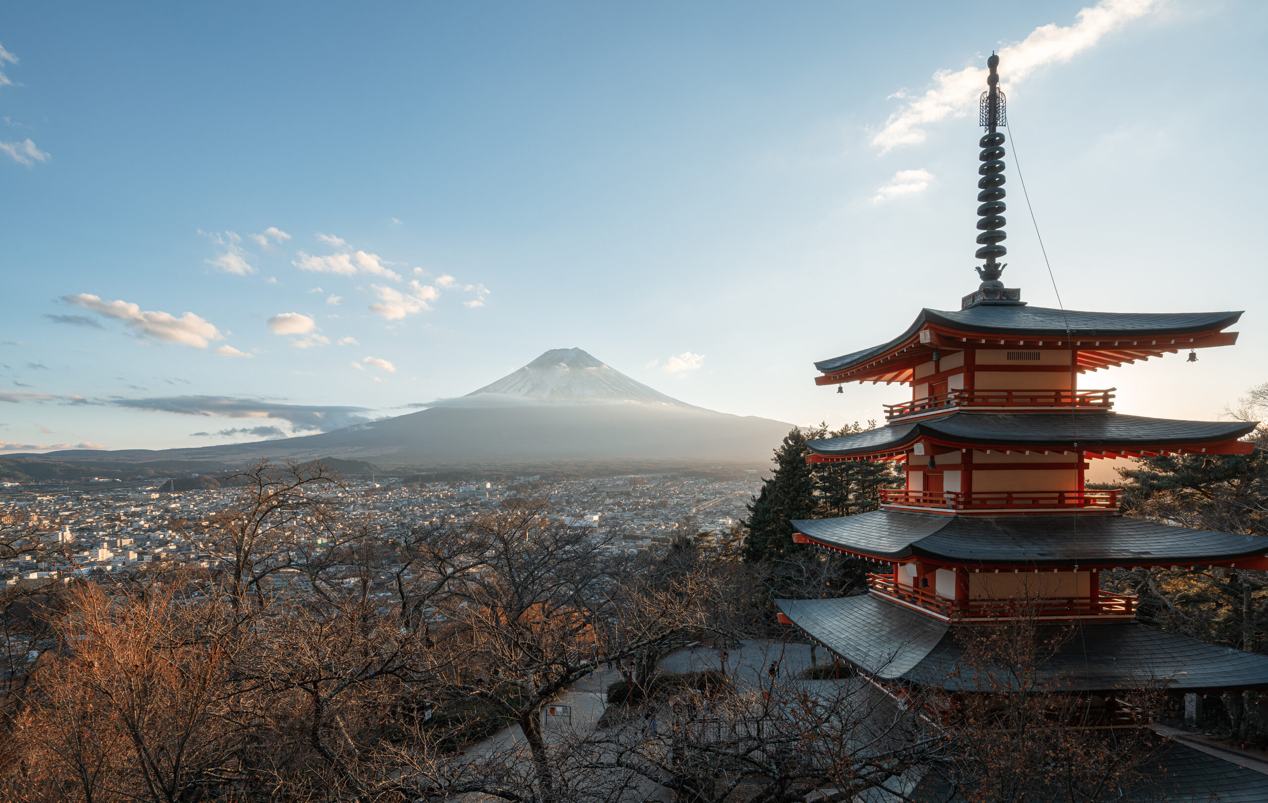 View of a historic tower overlooking Japan and Mount Fuji